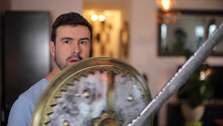 Adult man playing with medieval times sword and shield 