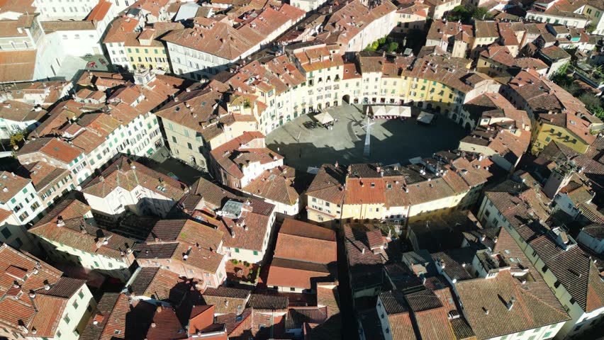 Lucca, Tuscany. Aerial view of city center with Piazza Anfiteatro and medieval buildings