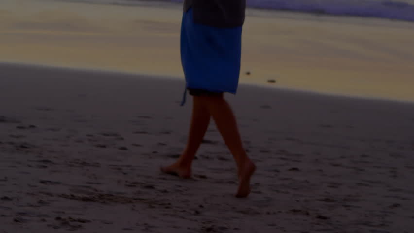On beach, person surrounded by colorful light trails, creating animation effect. Light painting, long exposure, creativity, night photography, vibrant, motion - Powered by Shutterstock - Get 15% off with code: PIKWIZARD15