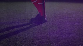 Soccer player with ball analyzing financial data graphs with animation overlay. Sports, finance, analysis, athlete, technology, strategy - Powered by Shutterstock - Get 15% off with code: PIKWIZARD15