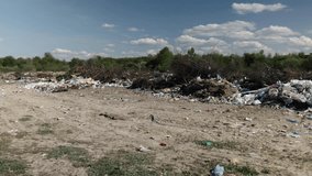 Trash dump, Littered landscape, Waste distress. Overflowing garbage on land areas showcases distressing neglect our environment, emphasizing acute need for overhaul waste management. - Powered by Shutterstock - Get 15% off with code: PIKWIZARD15