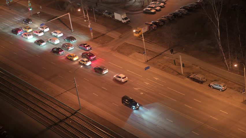 Point view of crossroads and city traffic. Top view of the intersection in the city and the traffic.