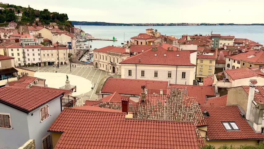 scenic seaside town in Slovenia, panoramic view of slovenian village Piran on the coast of Adriatic Sea, historic traditional touristic town in Slovenia