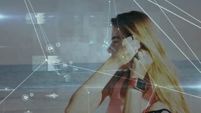 Woman listening to music with data processing animation over beach background. Technology, relaxation, digital, leisure, headphones, summer - Powered by Shutterstock - Get 15% off with code: PIKWIZARD15