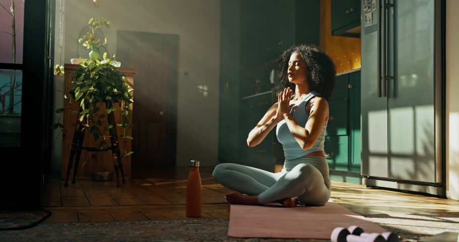 Yoga, meditation or woman breathe in home for wellness, health and namaste on mat. House, morning and person with prayer hands, pilates or mindfulness for calm exercise, peace and spiritual awareness