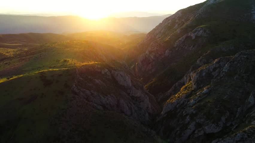 Sunrise over canyon in natural wilderness landscape