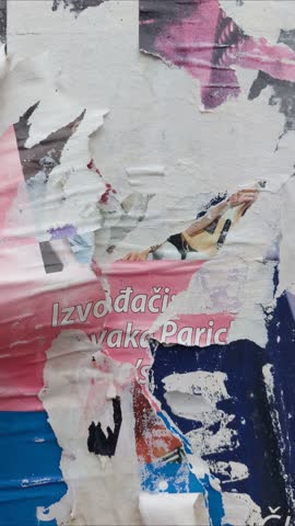 Torn and ripped street poster collage time lapse background