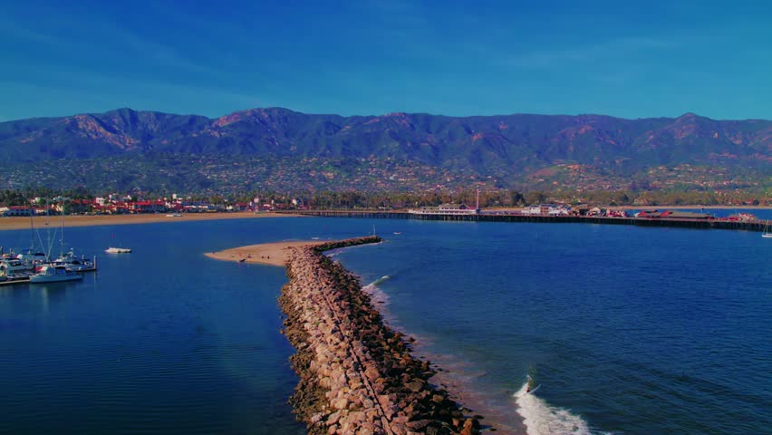 Santa Barbara's vibrant coastal recreation scene, featuring beach sports, water activities, and outdoor fitness.