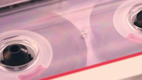 Cassette reels spin under soft light from a unique angle, revealing layers of analog charm and stirring quiet nostalgic emotions. - Powered by Shutterstock - Get 15% off with code: PIKWIZARD15