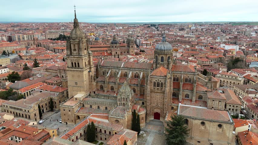 Salamanca Spain cathedral and streets in cloudy drone video