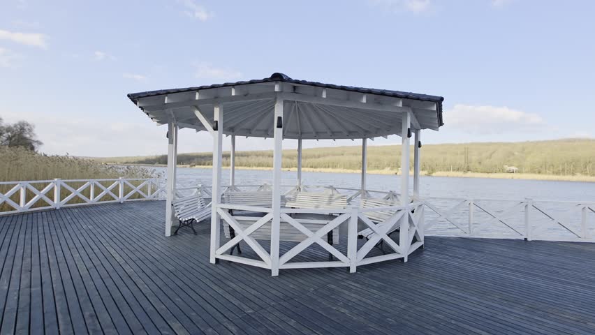 Sunset Over Lakeside Gazebo - Peaceful Riverside Retreat