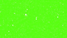 White particles flying on green chroma key background. Winter snow, falling snow animation loop - Powered by Shutterstock - Get 15% off with code: PIKWIZARD15