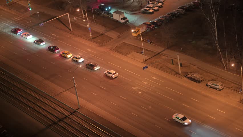 Point view of crossroads and city traffic. Top view of the intersection in the city and the traffic.