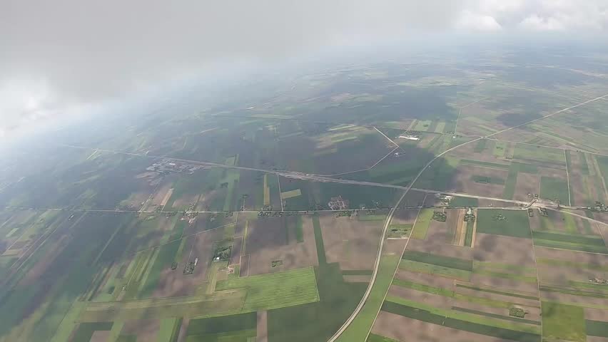 Opening of the parachute dome Opening of parachute canopy flight under canopy in blue sky with clouds on May 12 2024