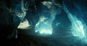 A mystical ice cave features stunning blue ice formations and illuminated textures, creating an enchanting atmosphere. Light filters through gaps, enhancing the natural beauty of the landscape. - Powered by Shutterstock - Get 15% off with code: PIKWIZARD15