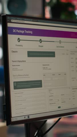 Vertical video Package tracking software and CRM appointment schedule app displayed on PC screens in logistics department. Computer displays in office showing parcels shipment monitoring and