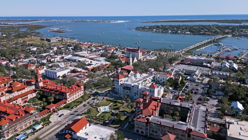 Flying North over historic St. Augustine, Florida and looking East at mid-morning	