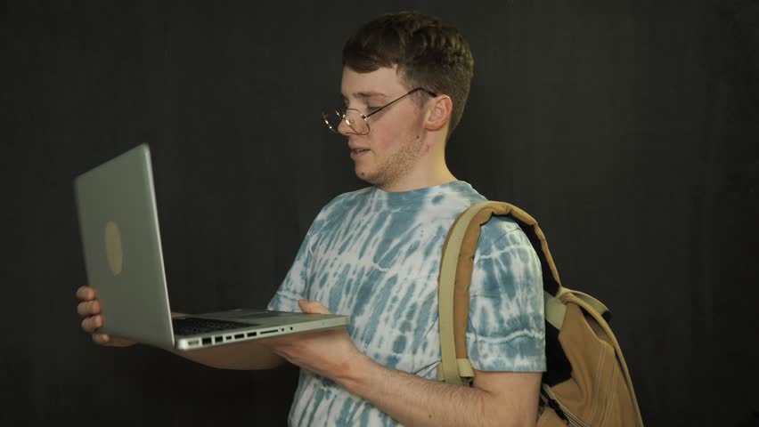 A happy student communicates, studies and rejoices.