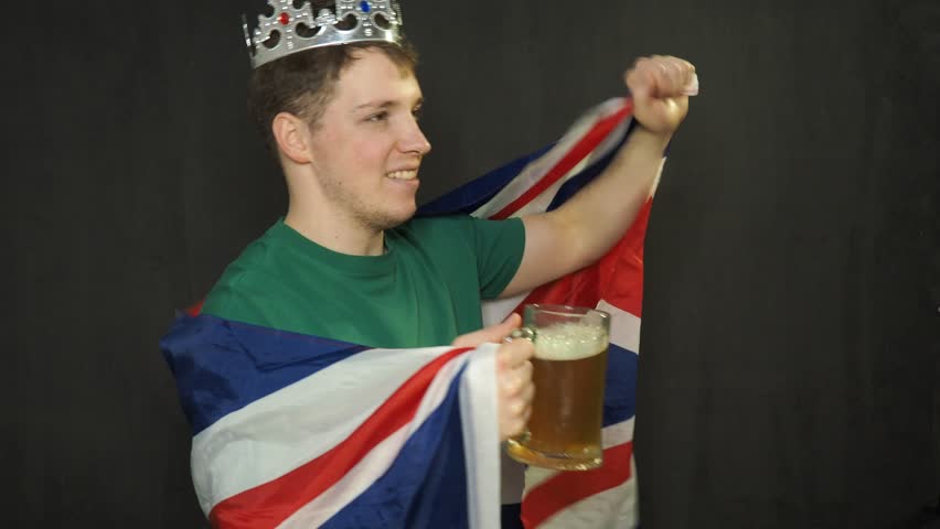 A football fan rejoices at the victory.