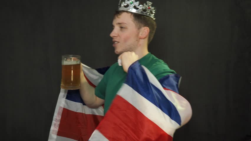 A football fan rejoices at the victory.