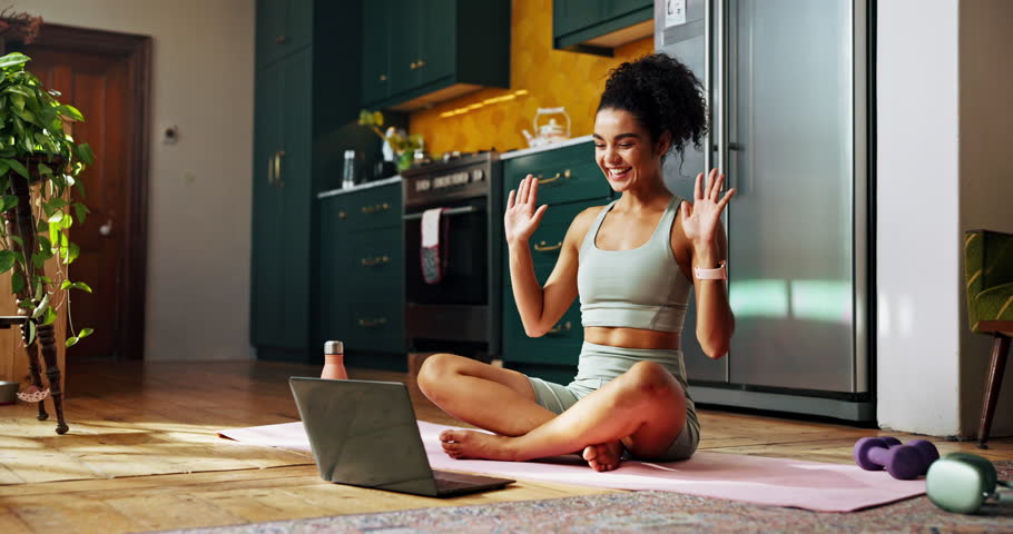Yoga, influencer and woman with laptop in home for workout videos, online tutorial and lesson. Content creator, trainer and person on computer wave for fitness, exercise and pilates subscription