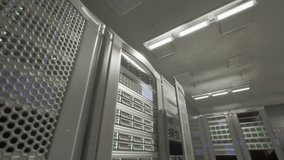 A server room filled with multiple windows, allowing ample natural light to illuminate the space. - Powered by Shutterstock - Get 15% off with code: PIKWIZARD15