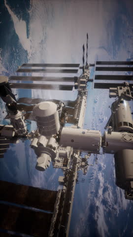 The International Space Station floats above Earth, highlighting humanitys achievements in space exploration. Various modules and solar panels are visible against the backdrop of our planet.