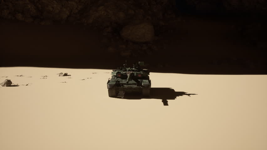 A military tank stands in the desert near a cave entrance, showcasing a scene of rugged terrain and ancient rock formations.