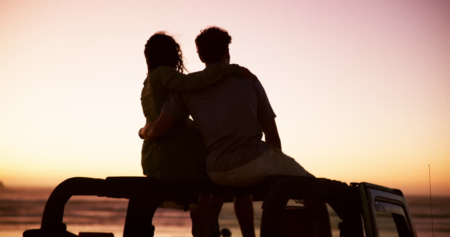 Road trip, car and couple at sunset for view, travel adventure and sightseeing on holiday. Back, hug and silhouette of people on vacation break for bonding, love and romantic outdoor date together