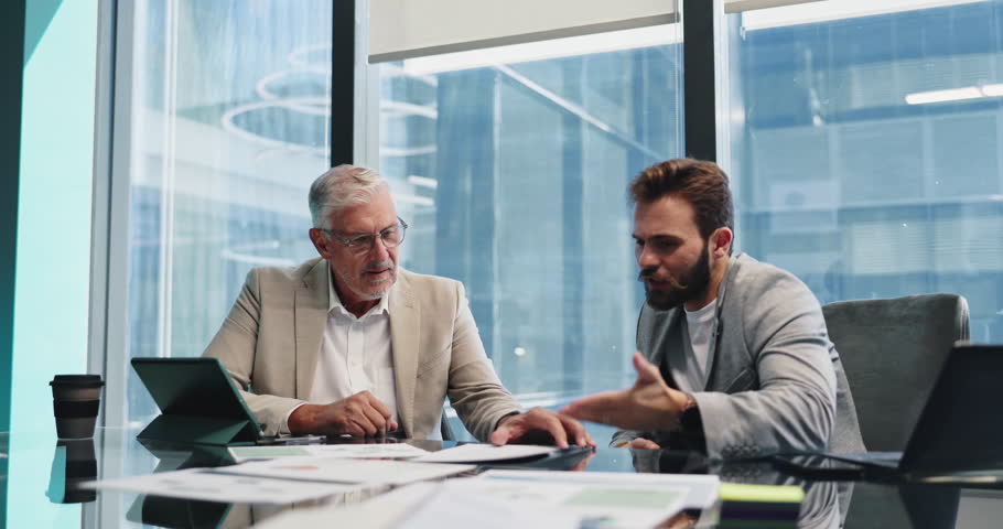 Documents, handshake and meeting with business people in boardroom of office for collaboration. Agreement, b2b and laptop with employee team in workplace together for acquisition, merger or success