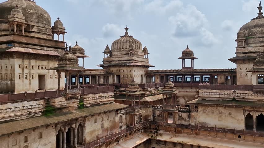 View of Jahangir Mahal with large and rugged domes in Madhya Pradesh, India.