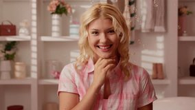 Happy smiling positive teenager girl teen teenage woman female blonde glamour in candy pink bathroom laughing touching young healthy skin face dermatology cosmetic cosmetology flying soap bubbles - Powered by Shutterstock - Get 15% off with code: PIKWIZARD15