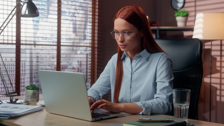 Serious confident Caucasian business woman girl female businesswoman worker lady in office with laptop computer work shake index finger no deny reject forbidden bad disagree refusal looking at camera