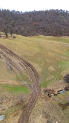 Aerial view of country hills. Beautiful rural scene with dead nature.