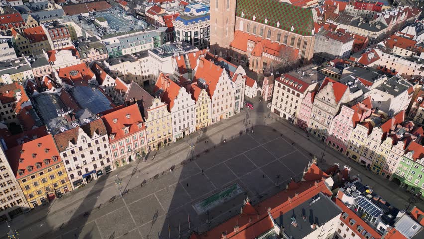 Wroclaw, Poland: Aerial footage of the famous market square in Wroclaw medieval old town with the ancient town hall and the St. Elizabeth