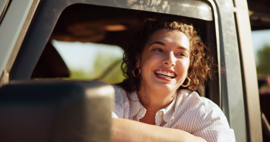 Window, road trip and woman with freedom, car and excited for tourism in vehicle, journey and holiday. Thinking, tourist and person in transport for commuting, travel or girl with smile on vacation