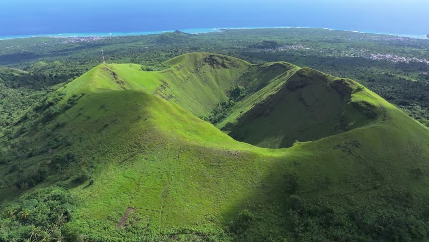 Comoros - Grande Comore - Ouzio volcanic area, Orbit left over a crater with an antenna