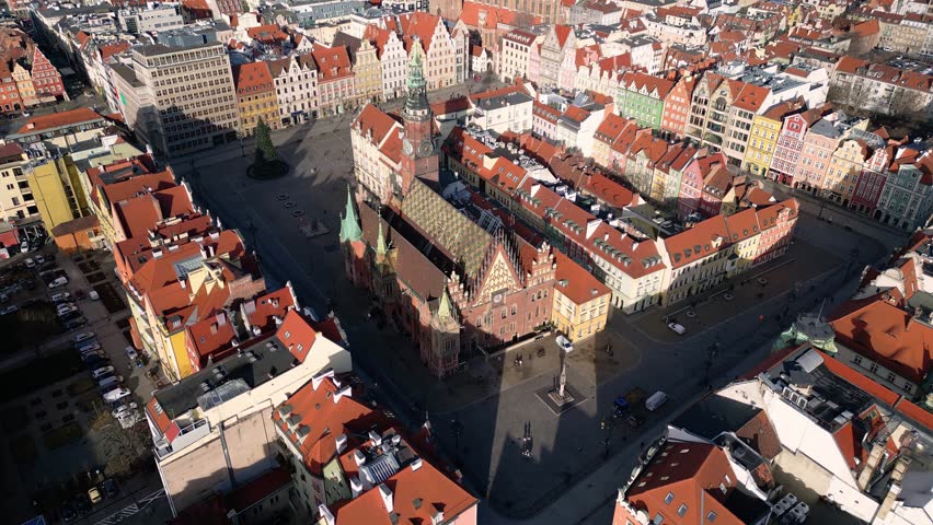 Wroclaw, Poland: Aerial footage of the famous market square in Wroclaw medieval old town with the ancient town hall and the St. Elizabeth