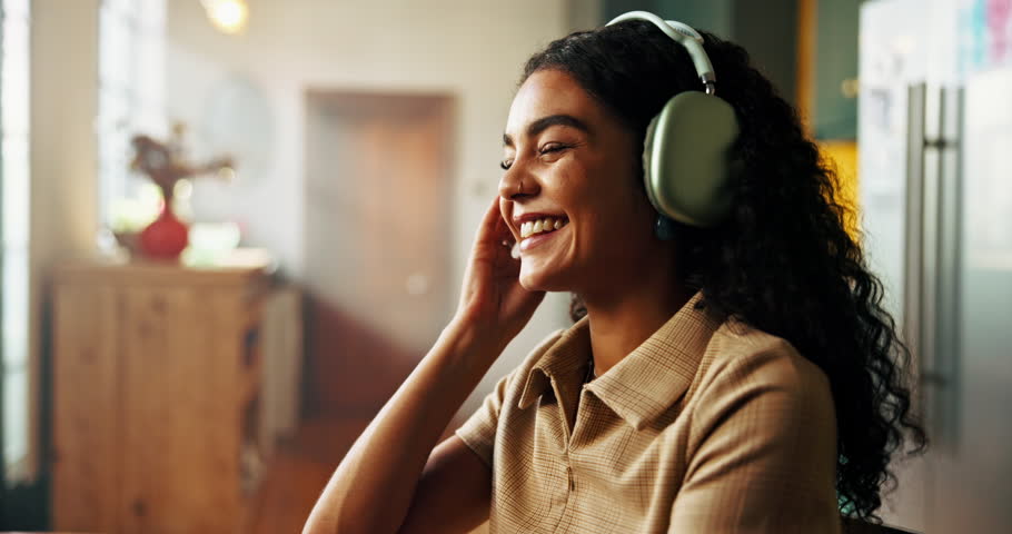 Remote work, music and woman on laptop with headphones listening to radio, audio and dancing. Working from home, freelancer and happy person on computer for internet, website and research for project