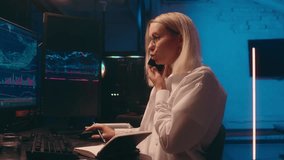 Caucasian business woman investor businesswoman girl busy stock broker trader analyst crypto currency computer online trading bitcoin trend price data chart write talking phone night e-commerce night - Powered by Shutterstock - Get 15% off with code: PIKWIZARD15