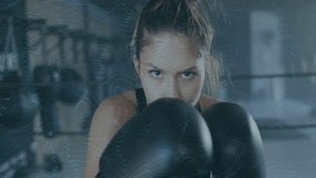 Boxing woman with digital wave animation overlaying scene in gym setting. Fitness, athletics, female athlete, virtual, technology, animated - Powered by Shutterstock - Get 15% off with code: PIKWIZARD15