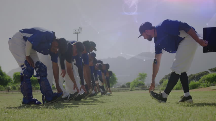 Baseball players stretching on field with data processing animation over scene. Sports, athletes, teamwork, technology, motion graphics, exercise - Powered by Shutterstock - Get 15% off with code: PIKWIZARD15