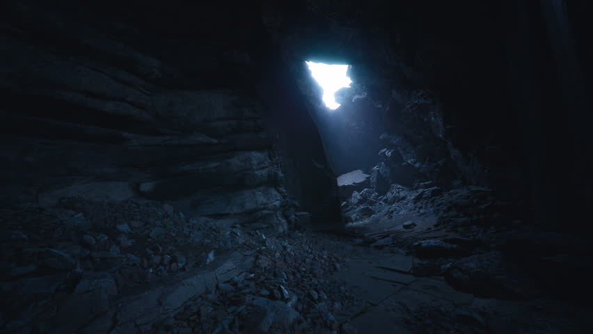 A narrow passageway in a cave reveals a bright light illuminating the rocky terrain. The atmosphere is shadowy, hinting at an unexplored depth waiting to be discovered.