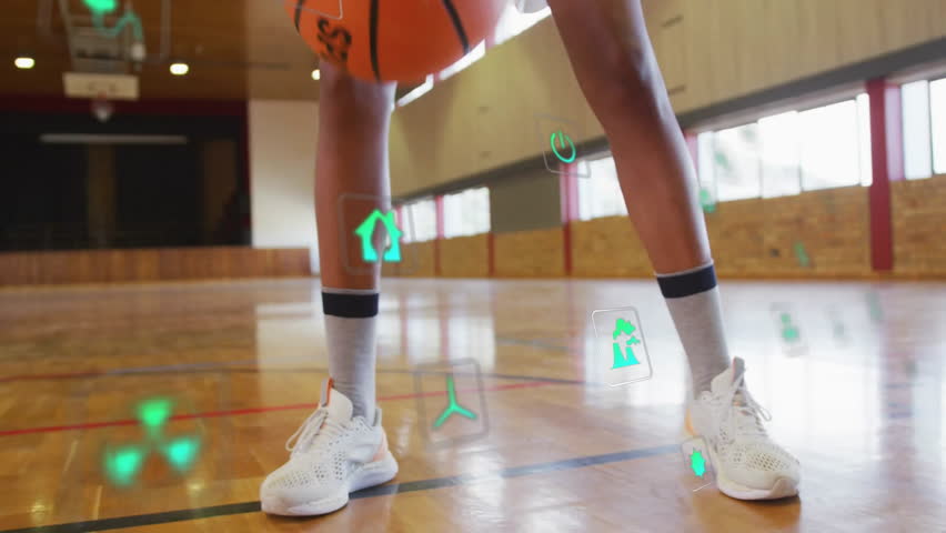 Dribbling basketball, player in gymnasium with animation of digital data icons. sports, athletic, technology, data analysis, innovation - Powered by Shutterstock - Get 15% off with code: PIKWIZARD15