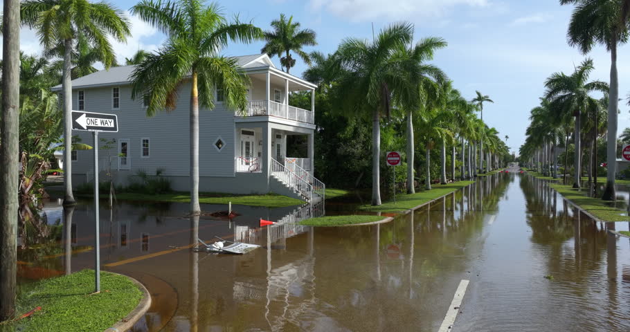 Flooded residential area with underwater houses from hurricane rainfall water in Punta Gorda, Florida. Aftermath of natural disaster in southern USA.