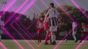 On field, soccer players playing with pink geometric animation overlay visible. digital, visual effects, teamwork, sport, gameplay, motion - Powered by Shutterstock - Get 15% off with code: PIKWIZARD15