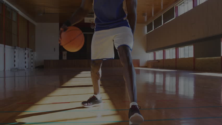 Basketball player dribbling with Coming Soon text and colorful animation overlay. Sport, competition, athletic, vibrant, motion, anticipation