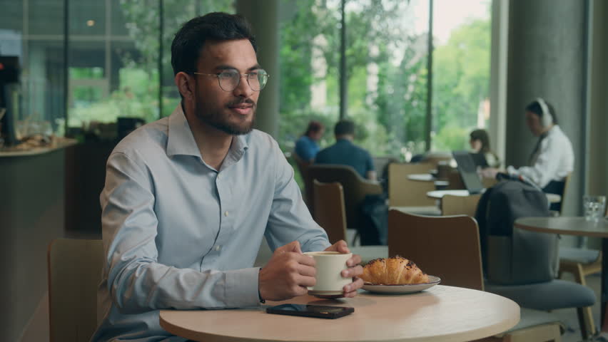 Indian business man guy male businessman visitor customer contactless NFC payment mobile phone buy purchase cafe order cashless service online bank wifi scan credit card smartphone terminal pay waiter