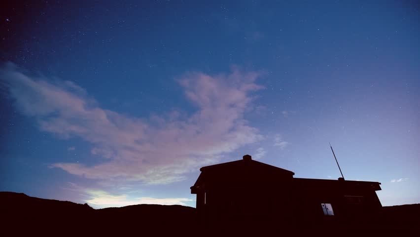 On a spring night at Datun Mountain, Beitou, Taipei, a lone house stands under a sky where stars whisper secrets of the cosmos and the Milky Way glows.