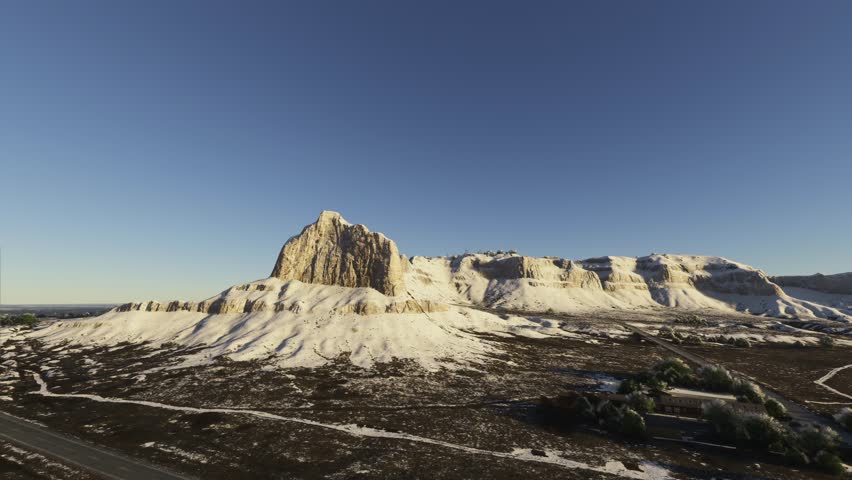 3D - Sunset aerial drone view of the snow in Scotts Bluff National Monument. Old Oregon Trail. Gering. Nebraska. United States